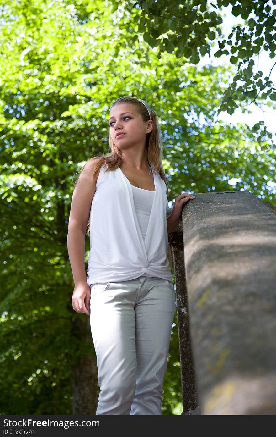 Portrait of young girl on forest background