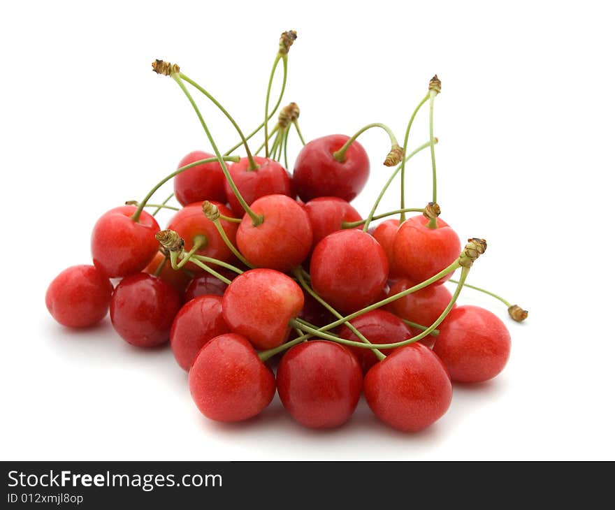 Wonderful red cherries on white background.