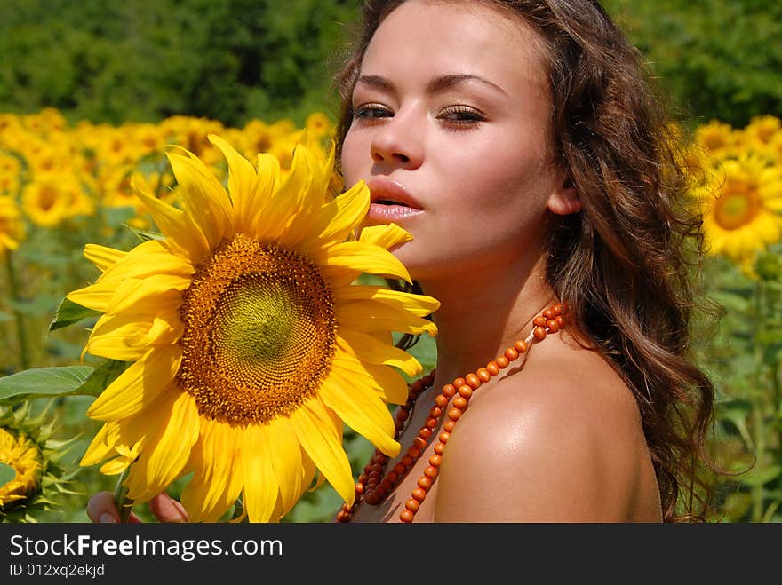 Portrait of the beautiful girl with flowers. Portrait of the beautiful girl with flowers