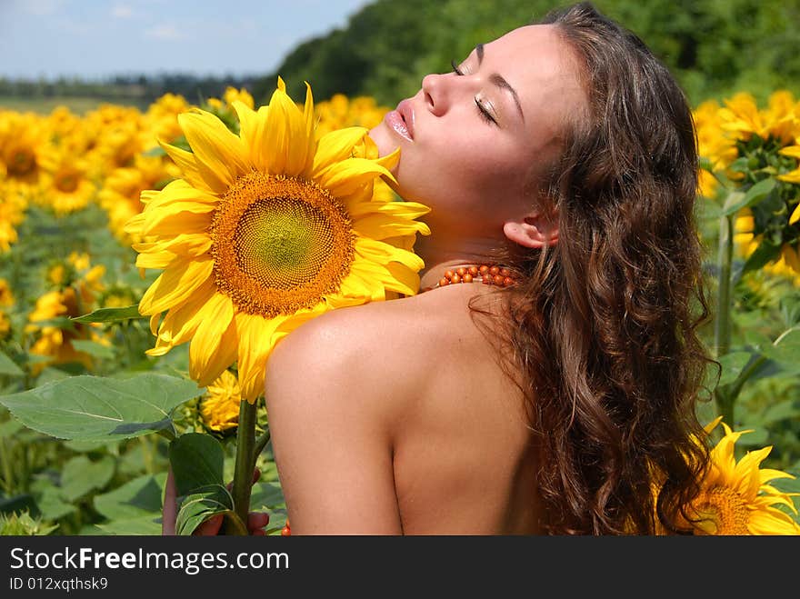 Portrait of the beautiful girl with flowers. Portrait of the beautiful girl with flowers