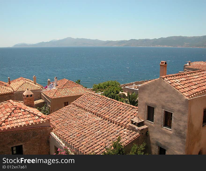 Greece, travel, medieval, castle, resort, seaside, Monemvasia, Peloponnese, tourism, ceramic tiles, roof. Greece, travel, medieval, castle, resort, seaside, Monemvasia, Peloponnese, tourism, ceramic tiles, roof