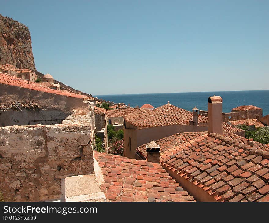 Greece, travel, medieval, castle, resort, seaside, Monemvasia, Peloponnese, tourism, ceramic tiles, roof. Greece, travel, medieval, castle, resort, seaside, Monemvasia, Peloponnese, tourism, ceramic tiles, roof