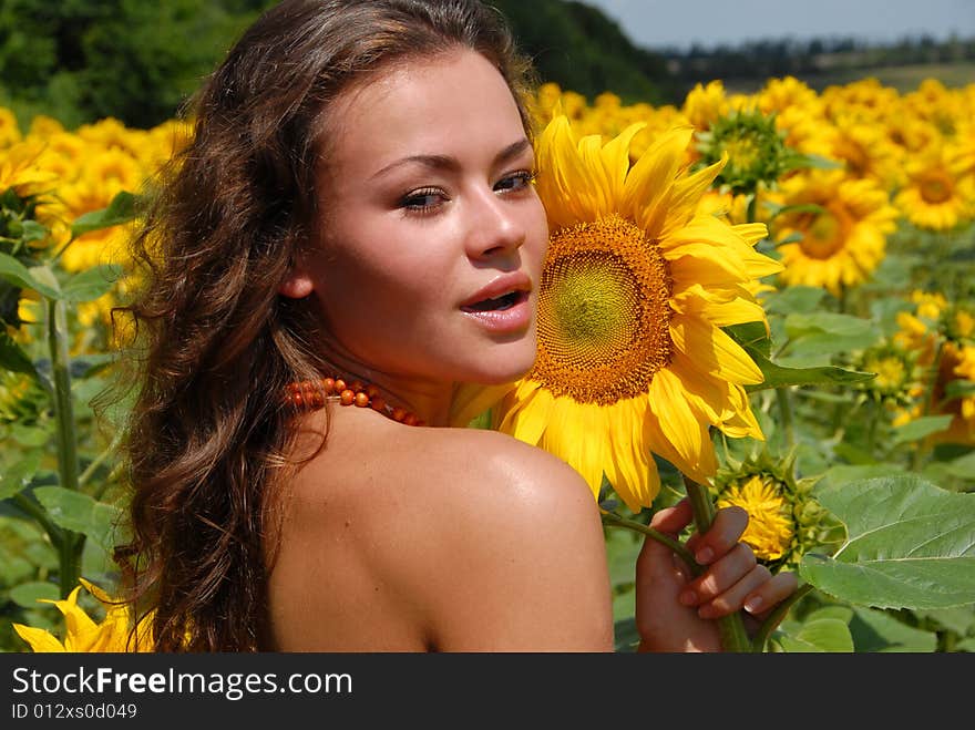 Portrait of the beautiful girl with flowers. Portrait of the beautiful girl with flowers