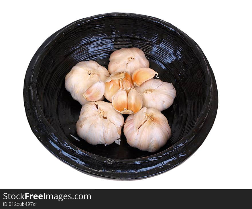 Garlic wholes & peels in wooden Black Bowl. Garlic wholes & peels in wooden Black Bowl