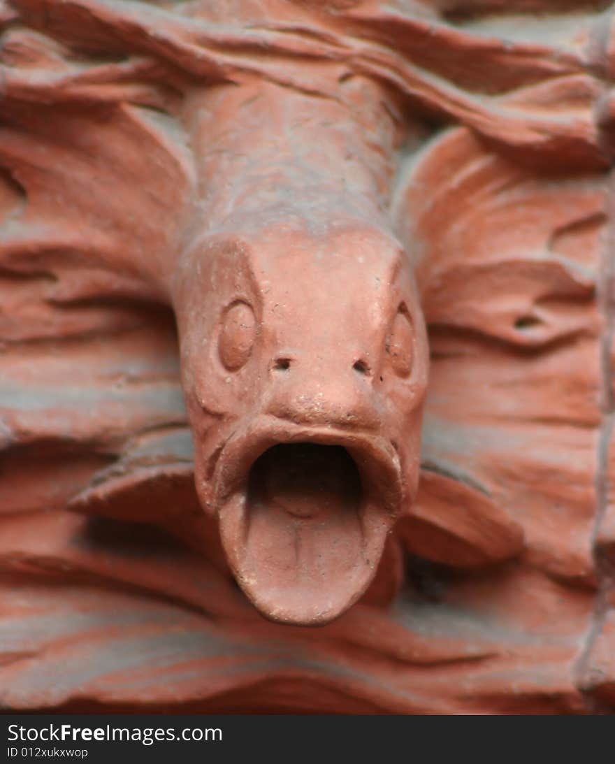 Photo of the details carved in a building. Photo of the details carved in a building