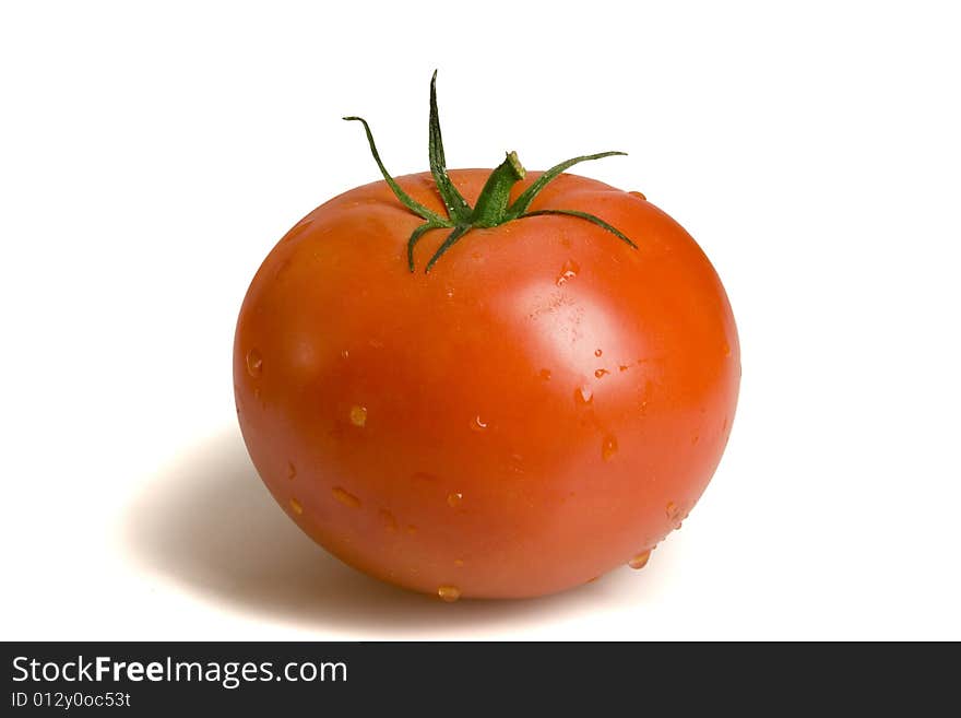 Fresh tomato on white ground