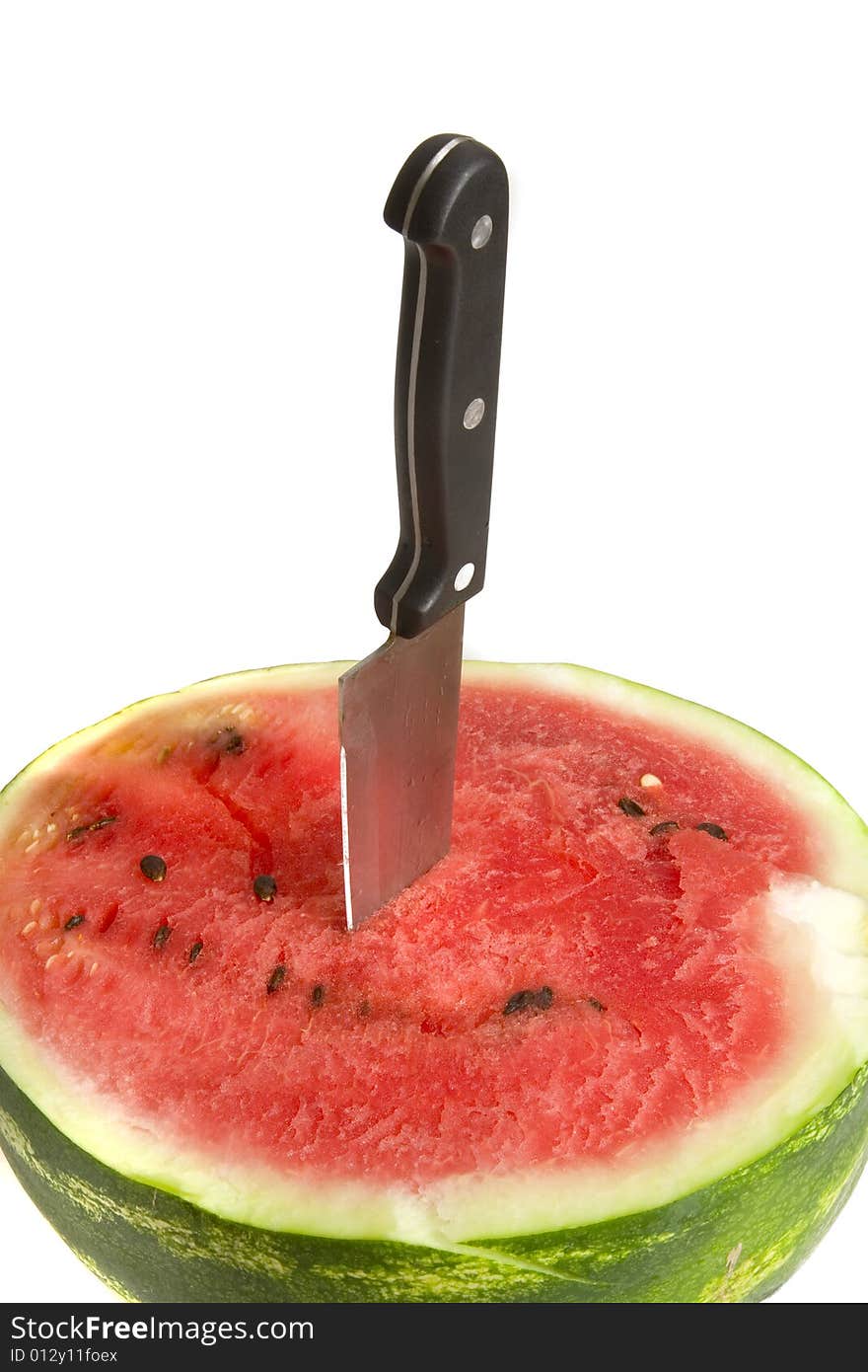 Half of juicy watermelon with knife