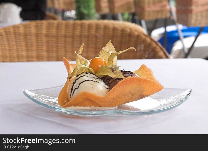 Dessert from ice-cream, chocolate and caramel