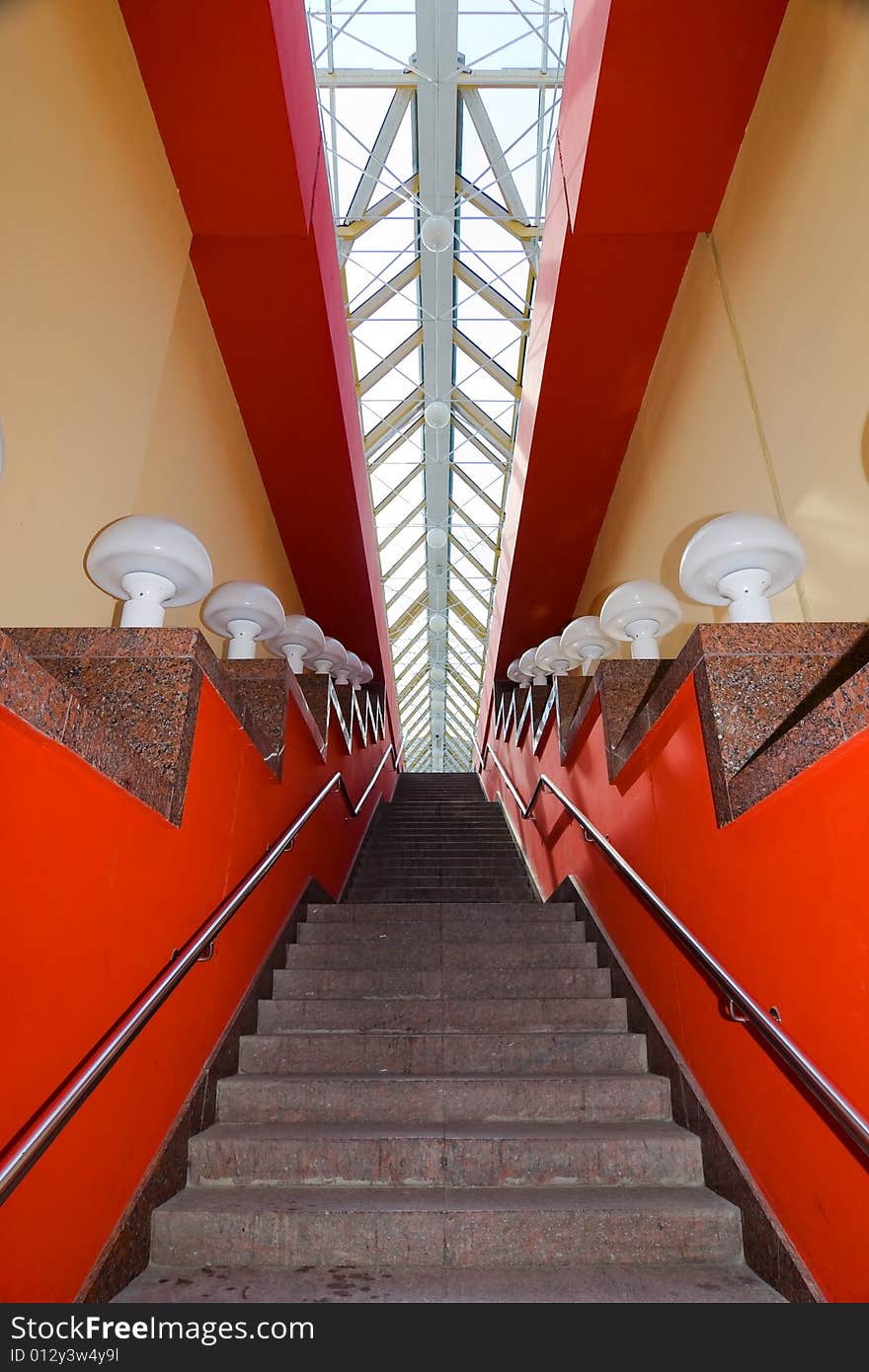 Indoor urban staircase with lamps