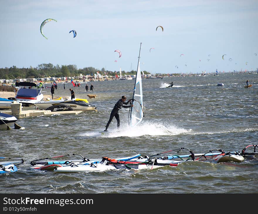 Men On Windsurfing