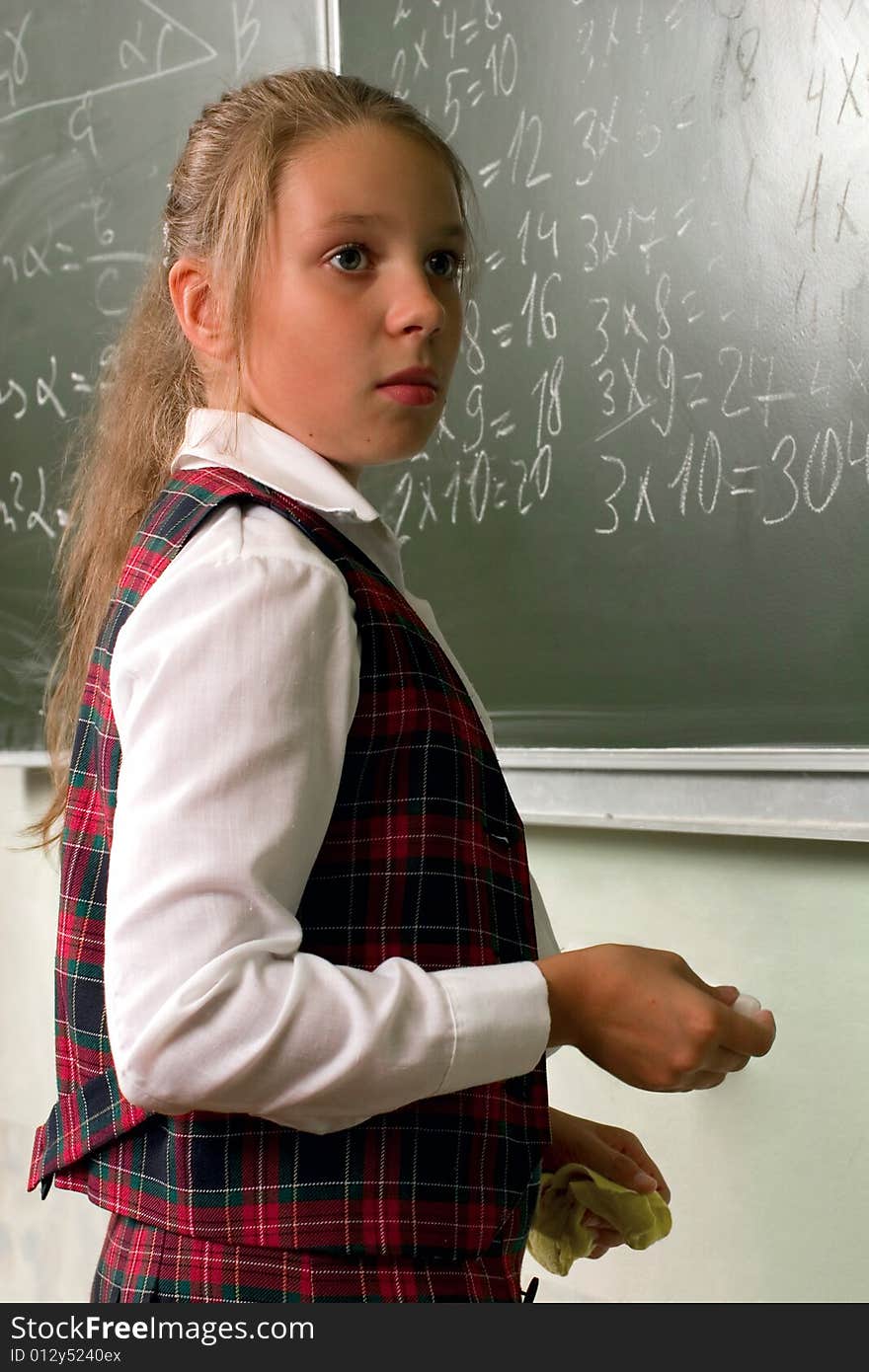 Schoolgirl at the blackboard