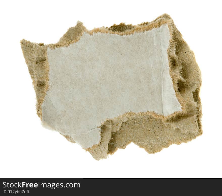 Torn piece of corrugated fiberboard isolated on a white background