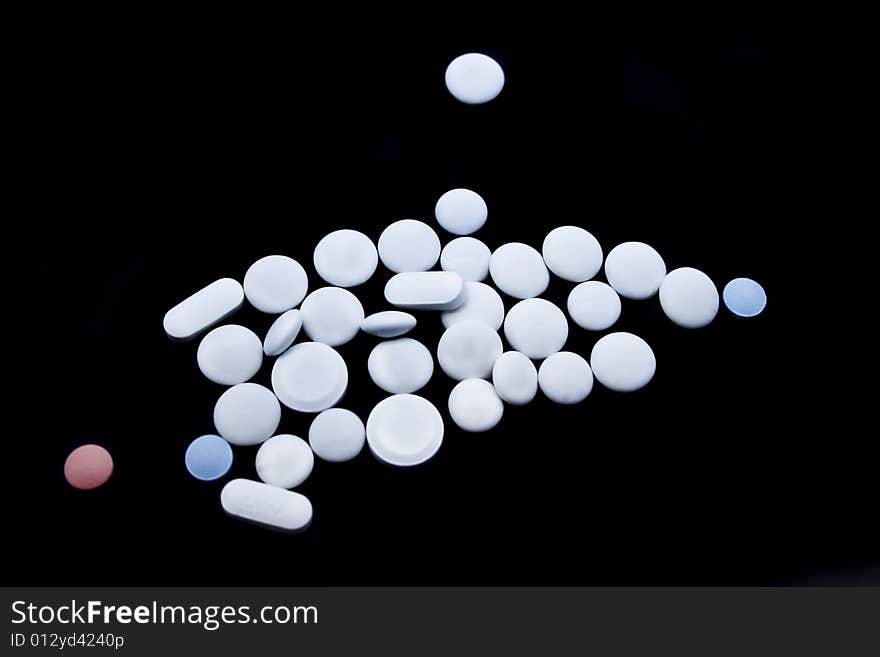 Tablets on a black background