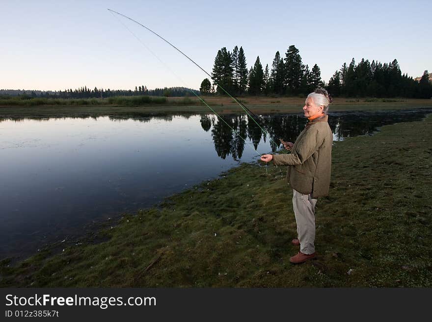 Senior woman looking at lake. Senior woman looking at lake