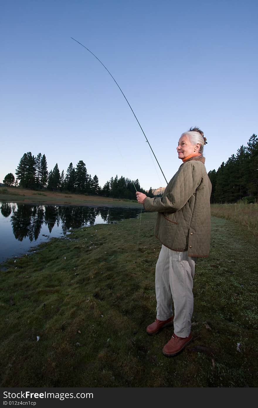 Senior woman looking at lake. Senior woman looking at lake