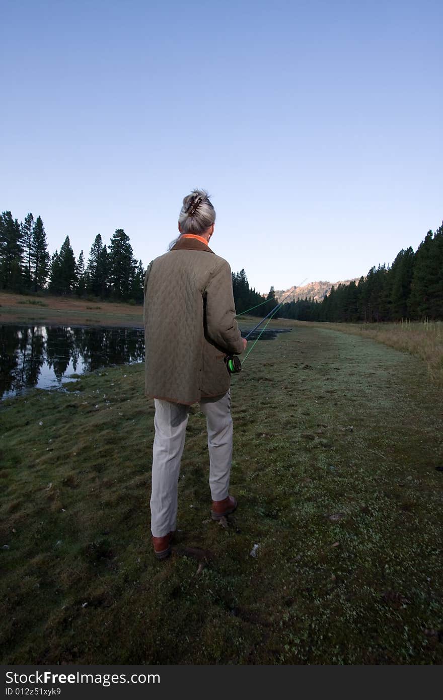 Senior woman looking at lake. Senior woman looking at lake