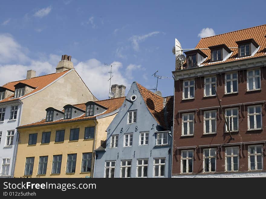 Old buildings from copenhagen with blue sky.