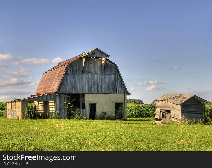 Old Abandoned Barn in front of corn field. Old Abandoned Barn in front of corn field