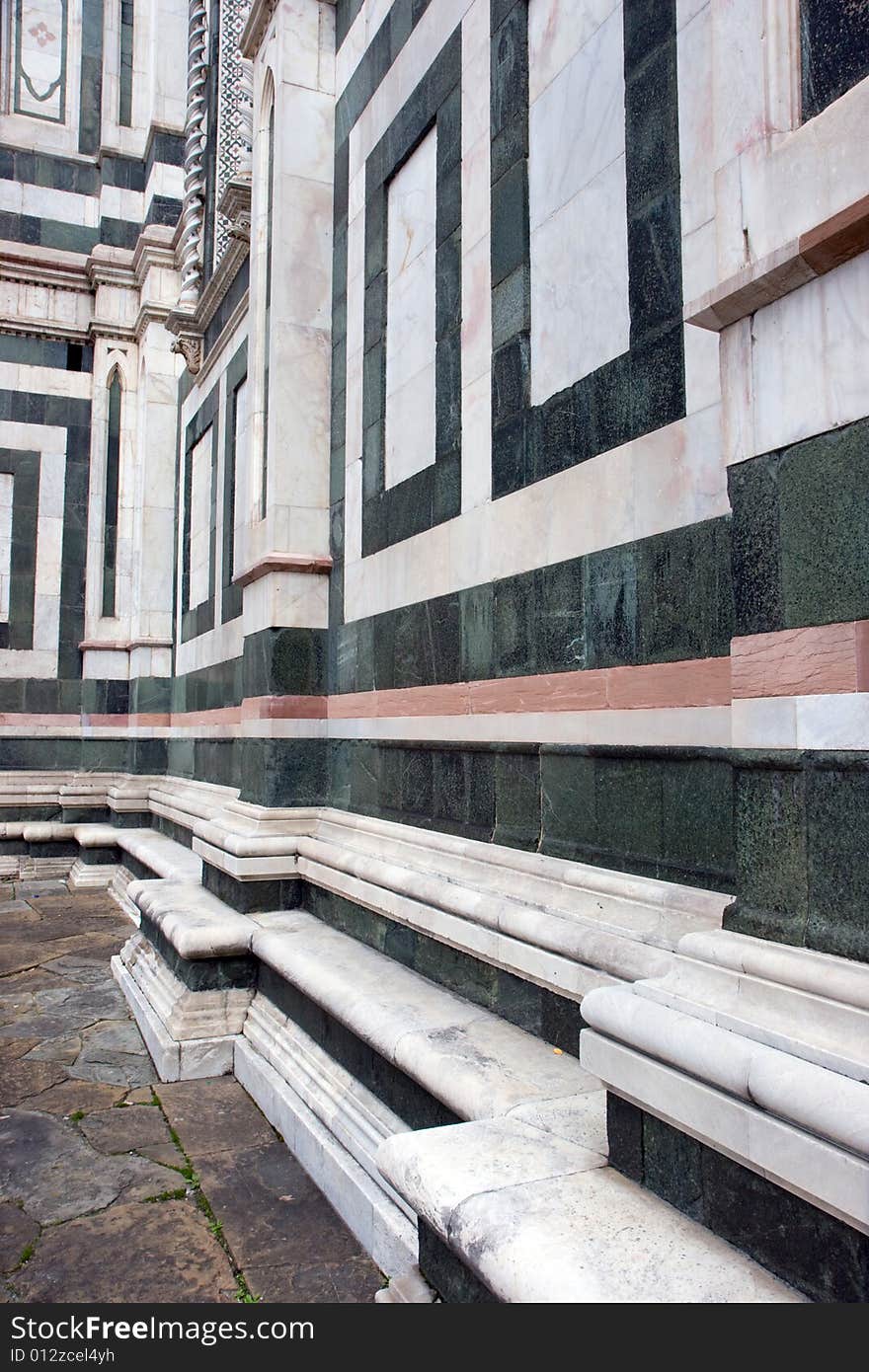 Abstract look at the distinctive green and white marble in the wall of the Duomo, Florence, Italy. Abstract look at the distinctive green and white marble in the wall of the Duomo, Florence, Italy