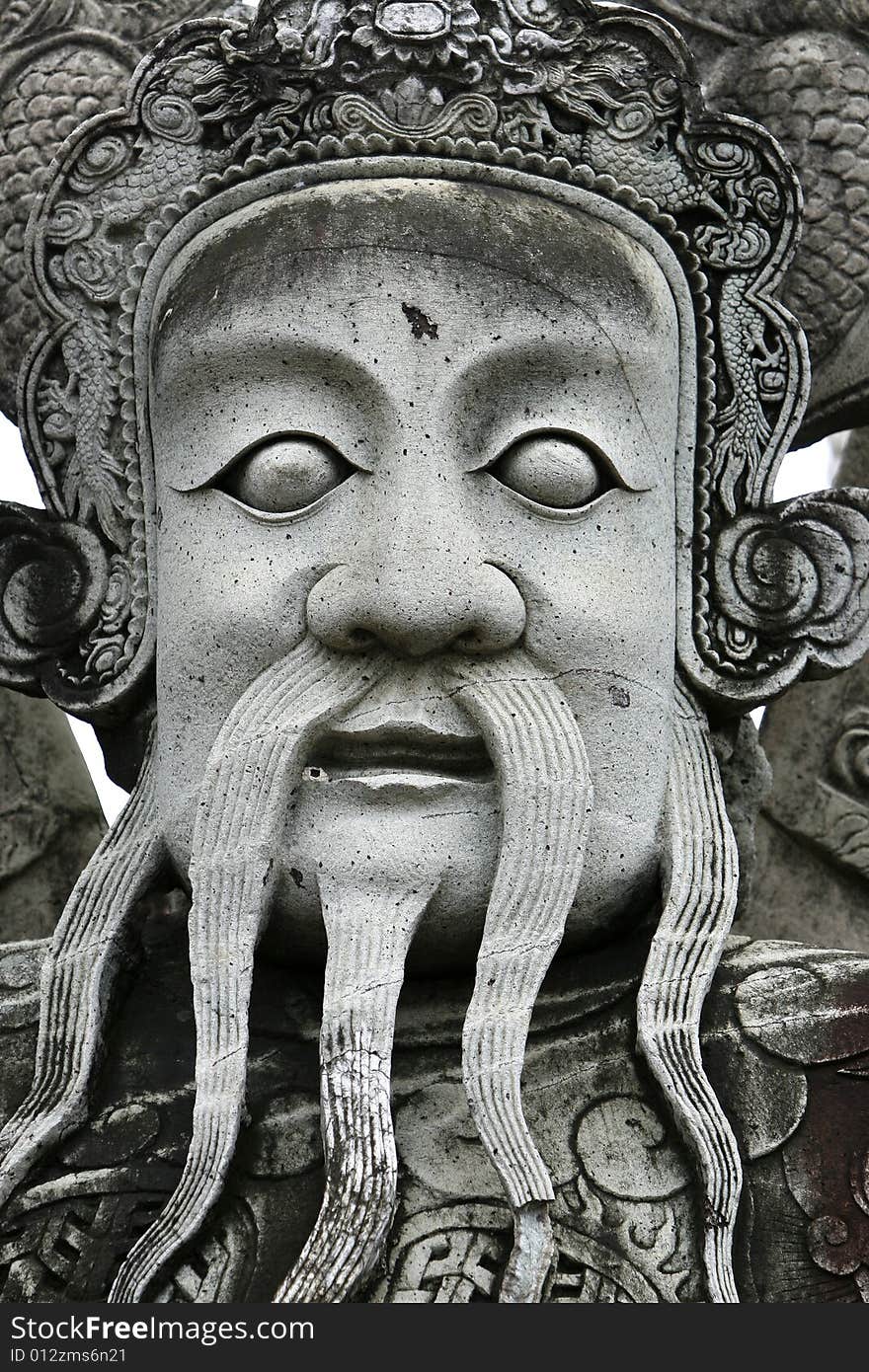 A  stone fighter in a temple at Thailand