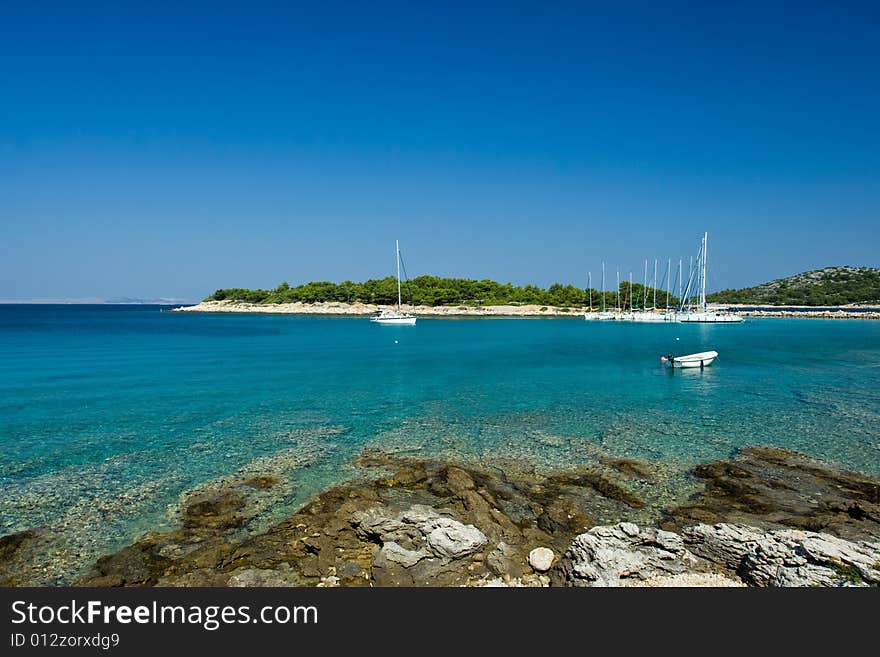 Sail boats docked in beautiful bay, Adriatic sea, Croatia