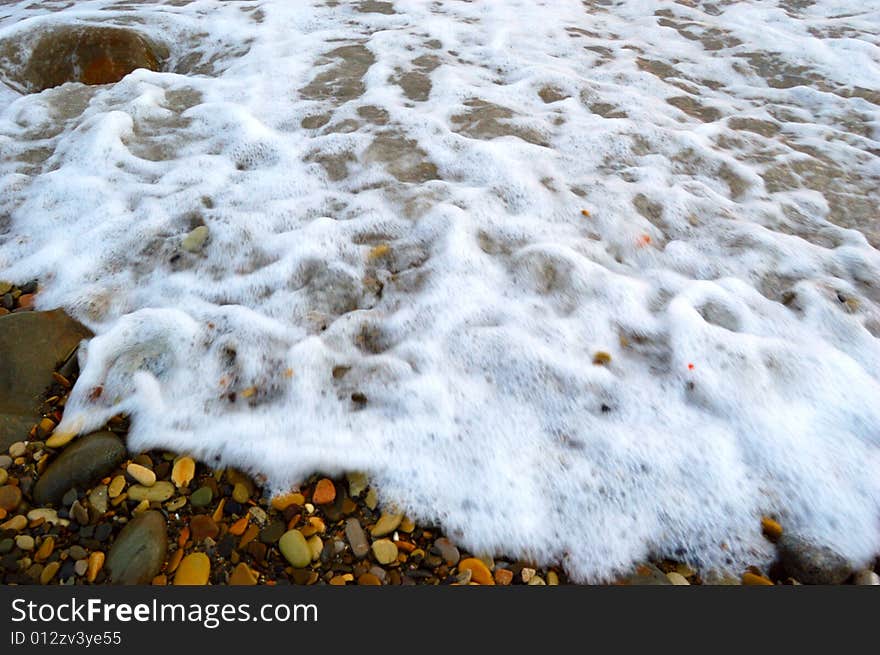 Closeup of sea shore covered with pebbles. Closeup of sea shore covered with pebbles