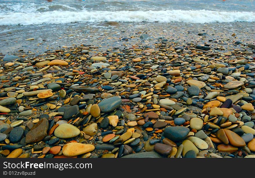 Closeup of sea shore covered with pebbles. Closeup of sea shore covered with pebbles