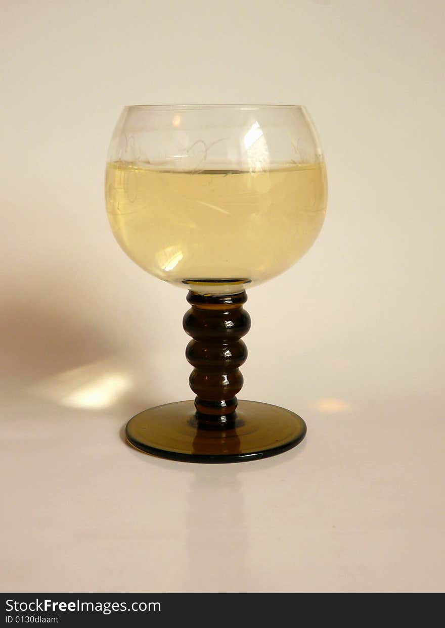 A close up view of a glass of white wine