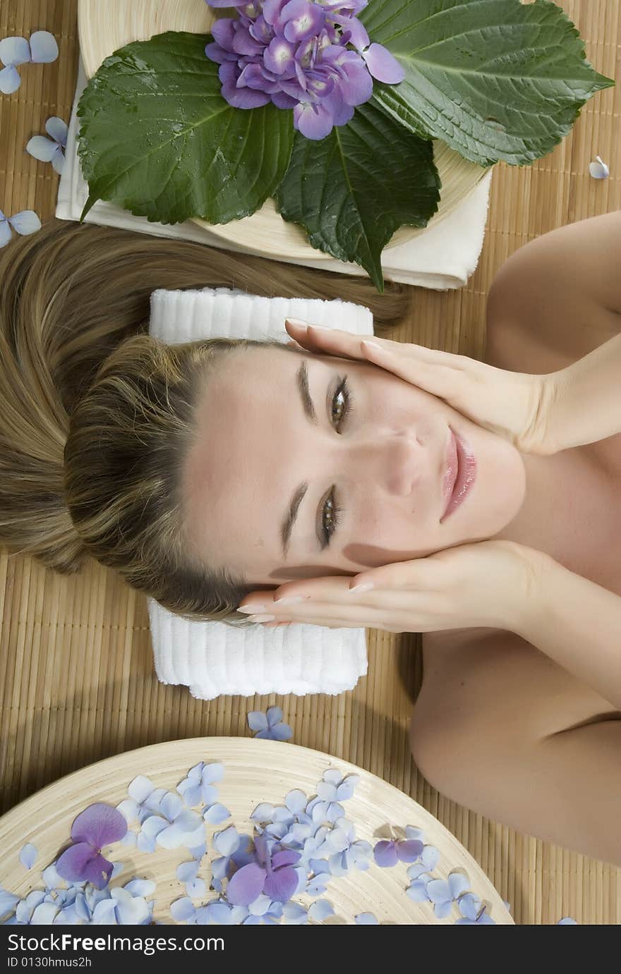 Woman in a day spa getting a deep tissue massage therapy