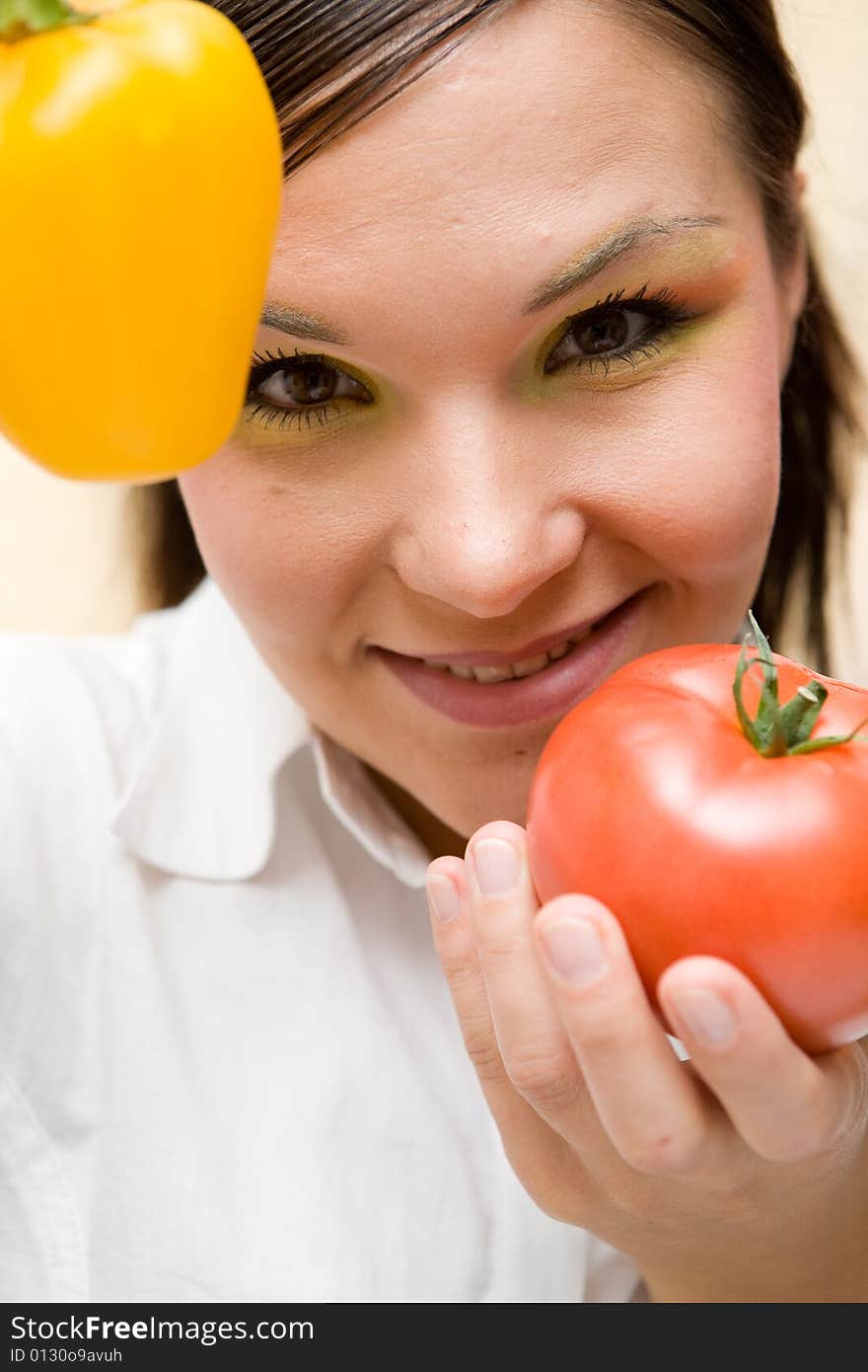 Attractive brunette woman with vegetable. Attractive brunette woman with vegetable