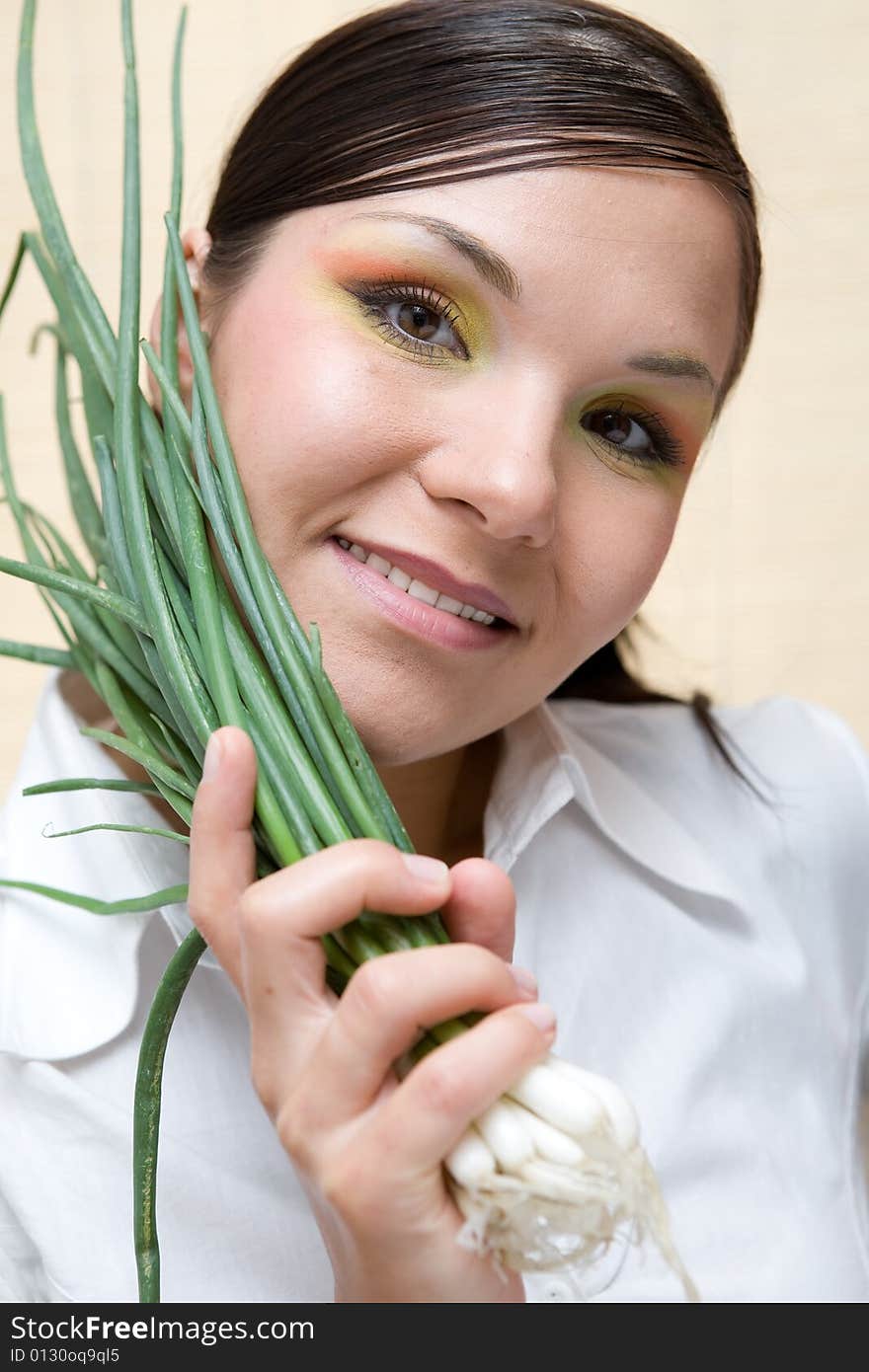 Attractive brunette woman with vegetable. Attractive brunette woman with vegetable