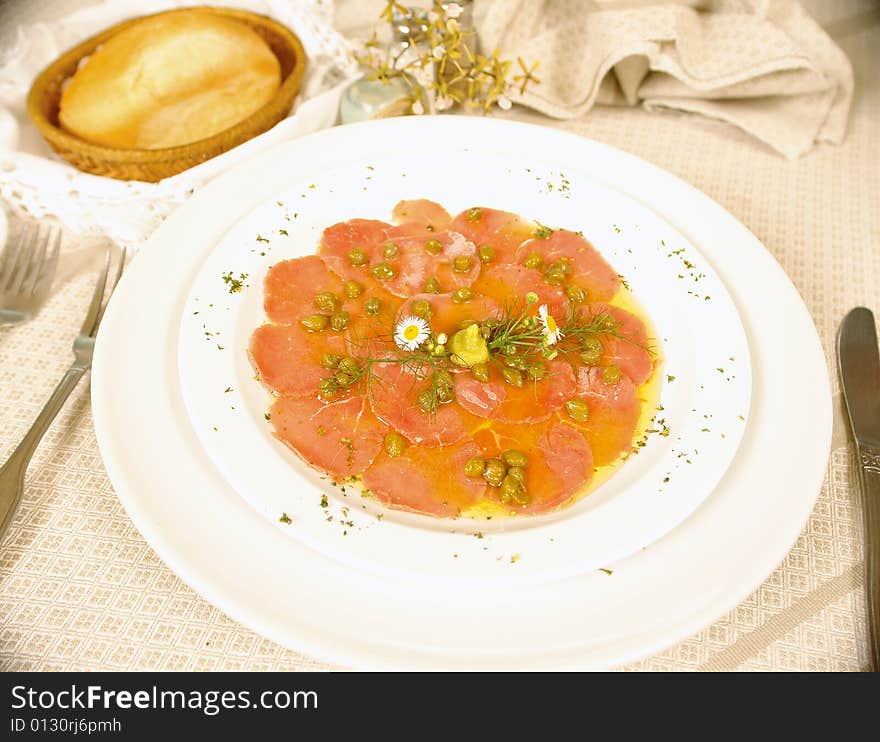 Beef carpaccio with capers and lemon