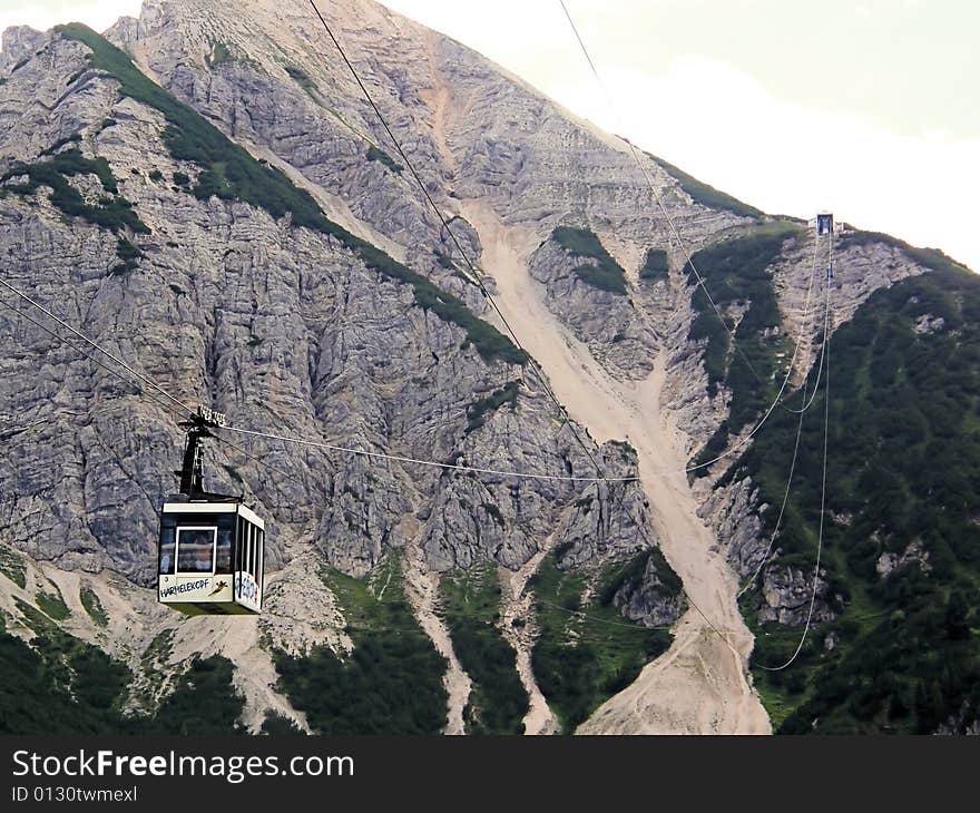 A courageous cableway over an austrian rock mountain. A courageous cableway over an austrian rock mountain.