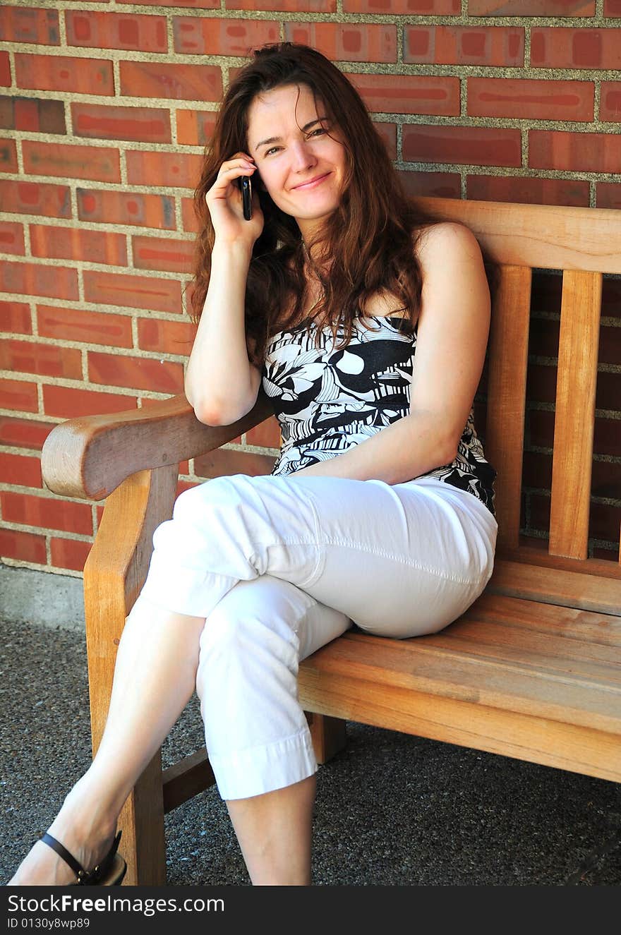 Female beauty talking on a cellphone.