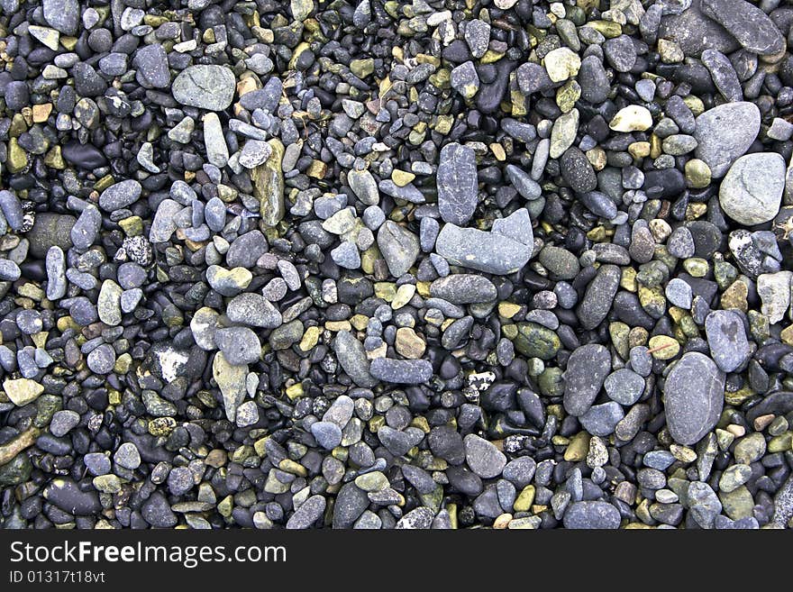 Smooth pebbles and stones on the shore. Smooth pebbles and stones on the shore