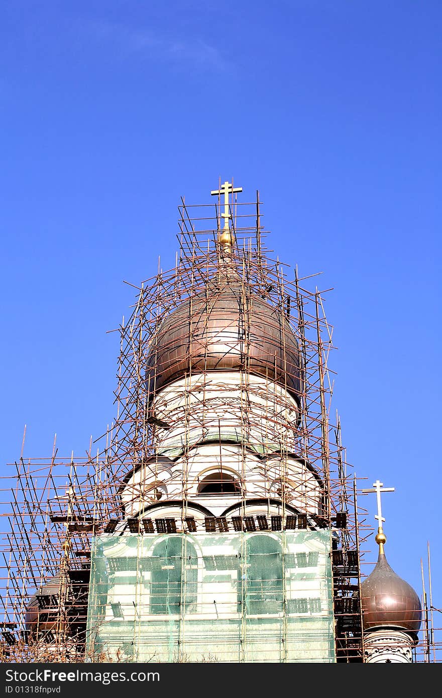 Restoration site of an orthodox church – scaffoldings around church cupola