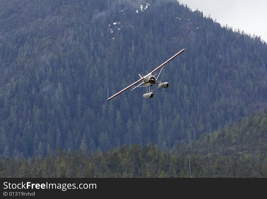 Float plane preparing for landing, Ketchikan, AK. Float plane preparing for landing, Ketchikan, AK