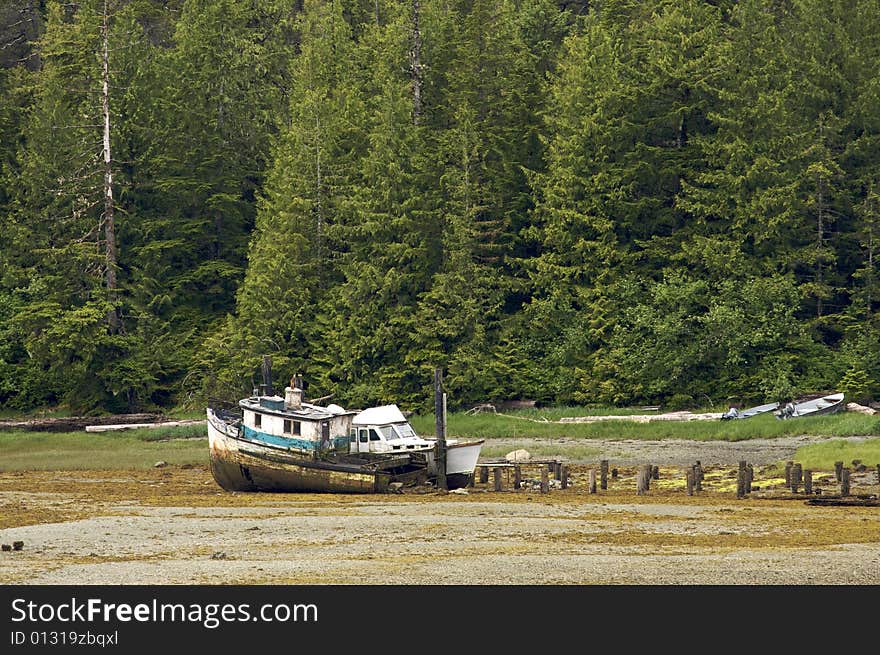 Abandoned ships along the shoreline in Ketchikan, AK. Abandoned ships along the shoreline in Ketchikan, AK