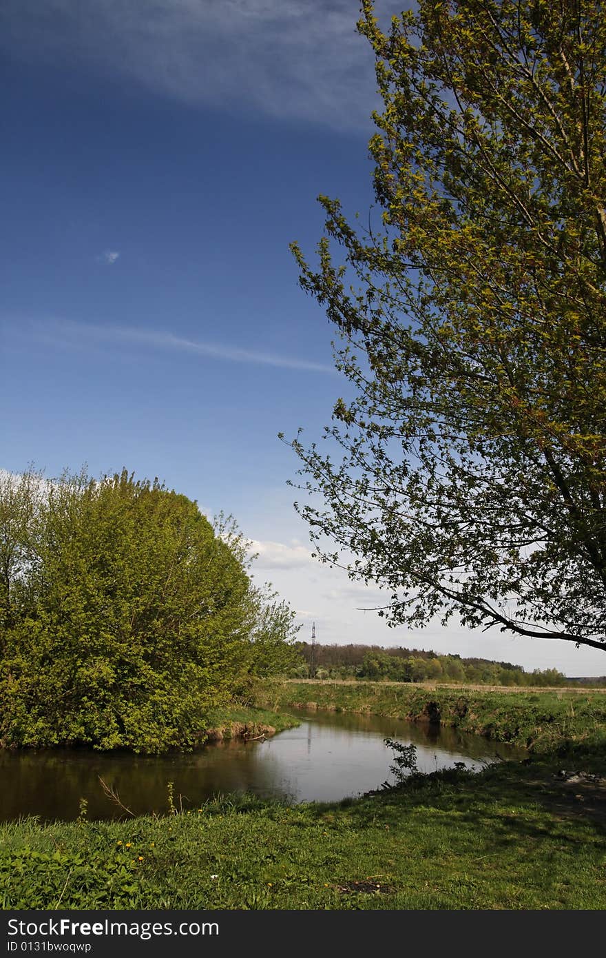 Spring landscape with meandering river