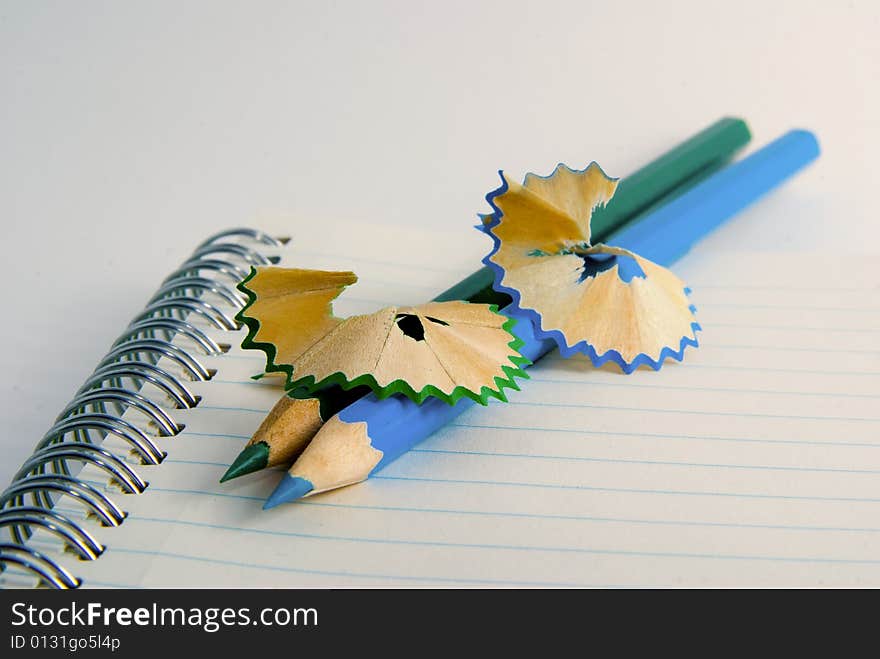 Closeup of colored crayons on white background