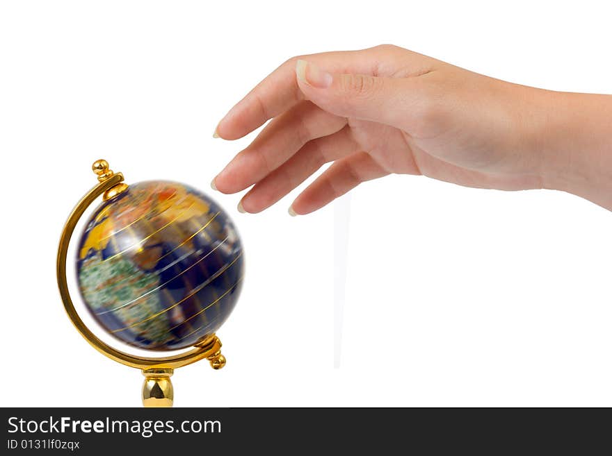 Hand and spinning globe isolated on white background