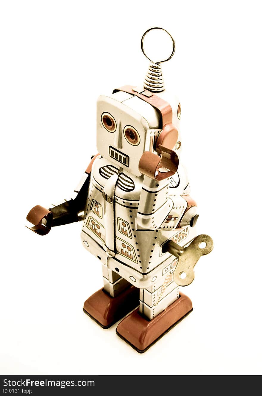 Old tin robot toy in retro color