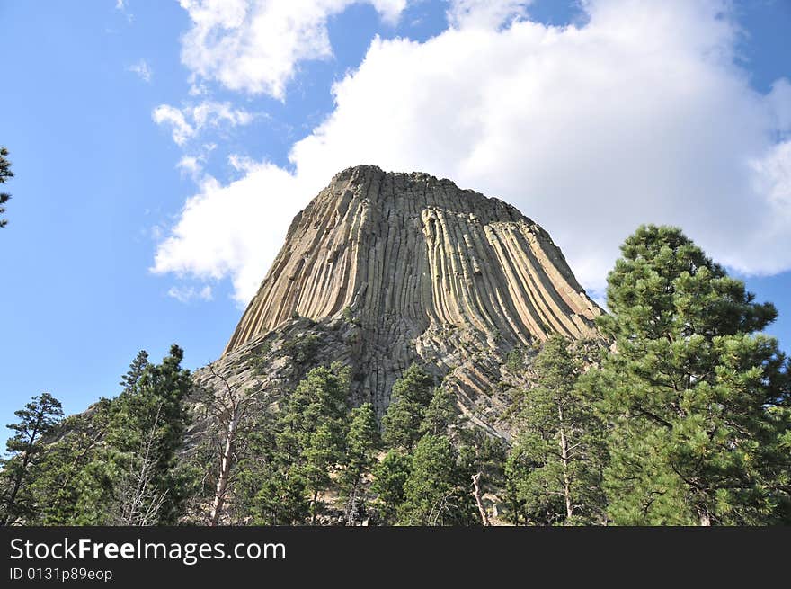 Devils tower from the southeast via the walking path that skirts the boulder field below. Devils tower from the southeast via the walking path that skirts the boulder field below.