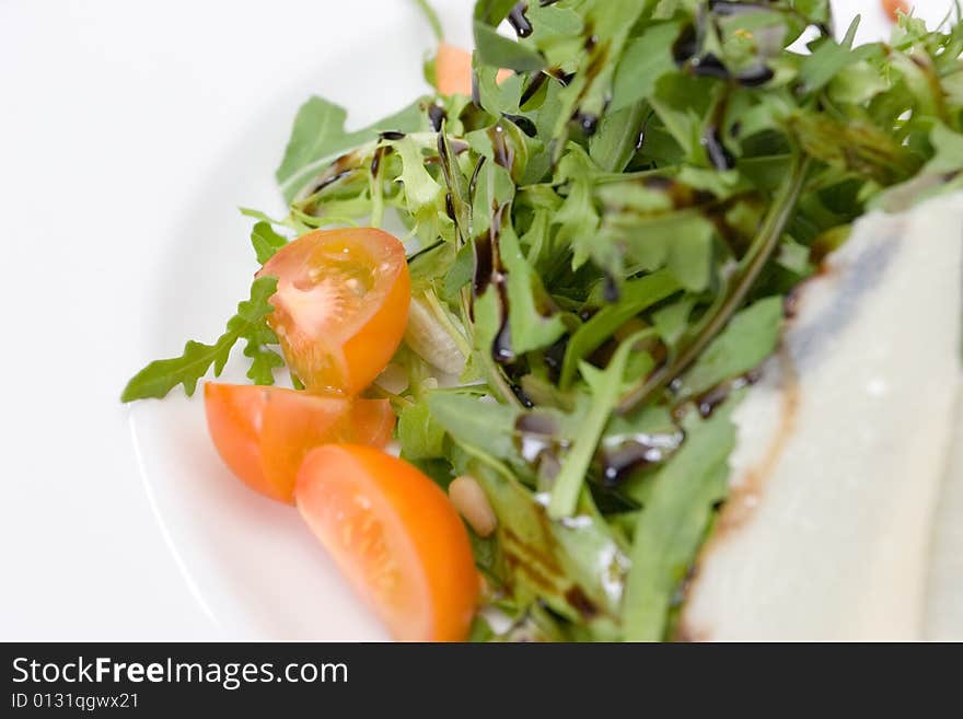 Refined food from a restaurant on a white plate. Refined food from a restaurant on a white plate