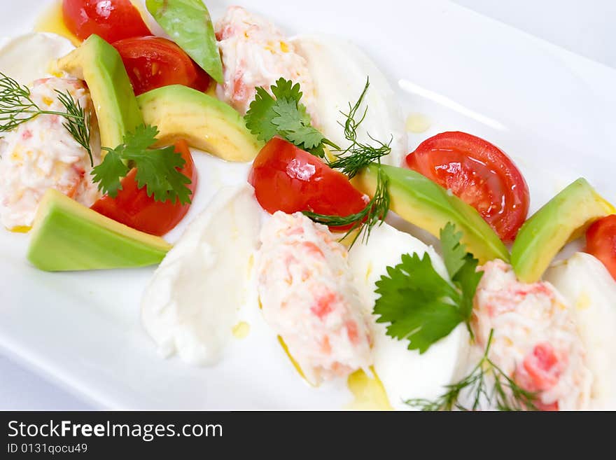 Refined food from a restaurant on a white plate. Refined food from a restaurant on a white plate