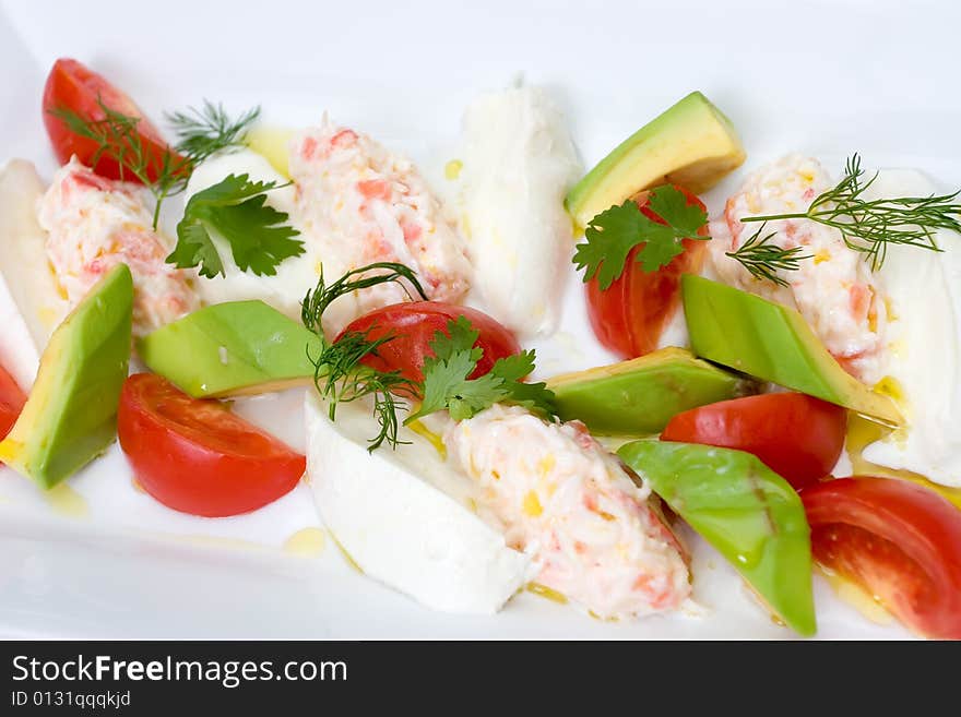 Refined food from a restaurant on a white plate. Refined food from a restaurant on a white plate