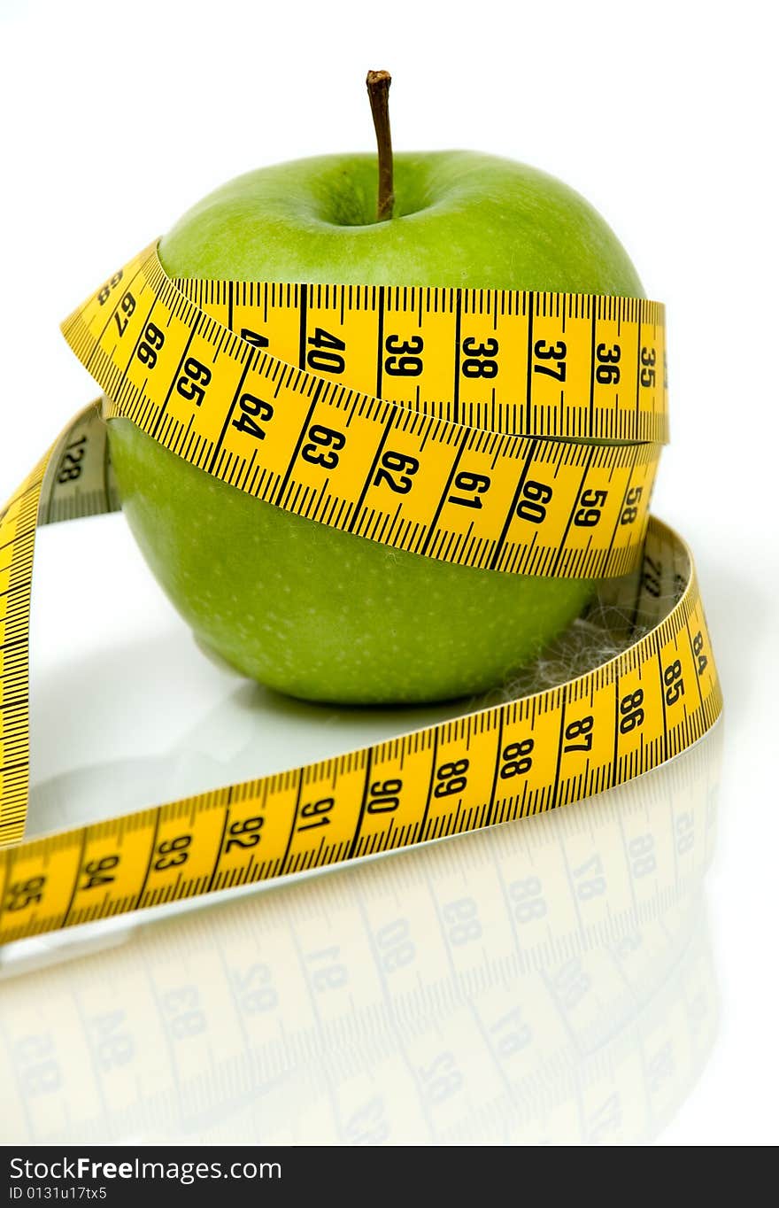 Apple and measuring tape