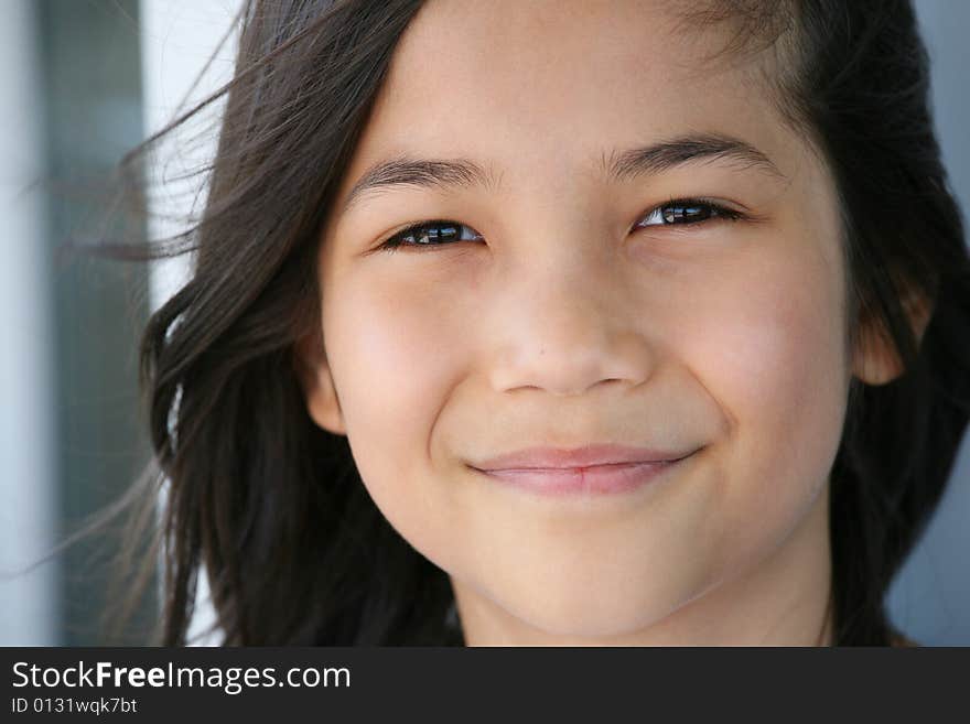 Happy little girl smiling outdoors. Happy little girl smiling outdoors