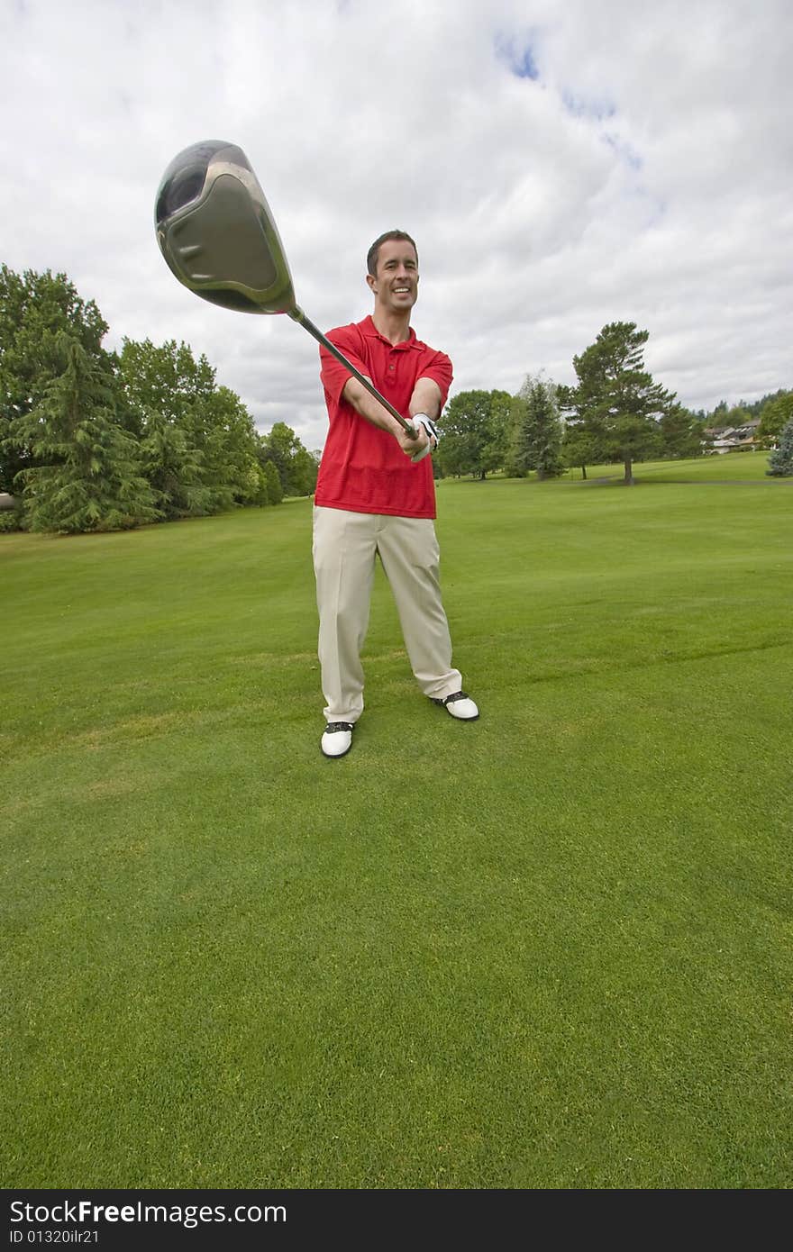 Man with Golf Club - Vertical