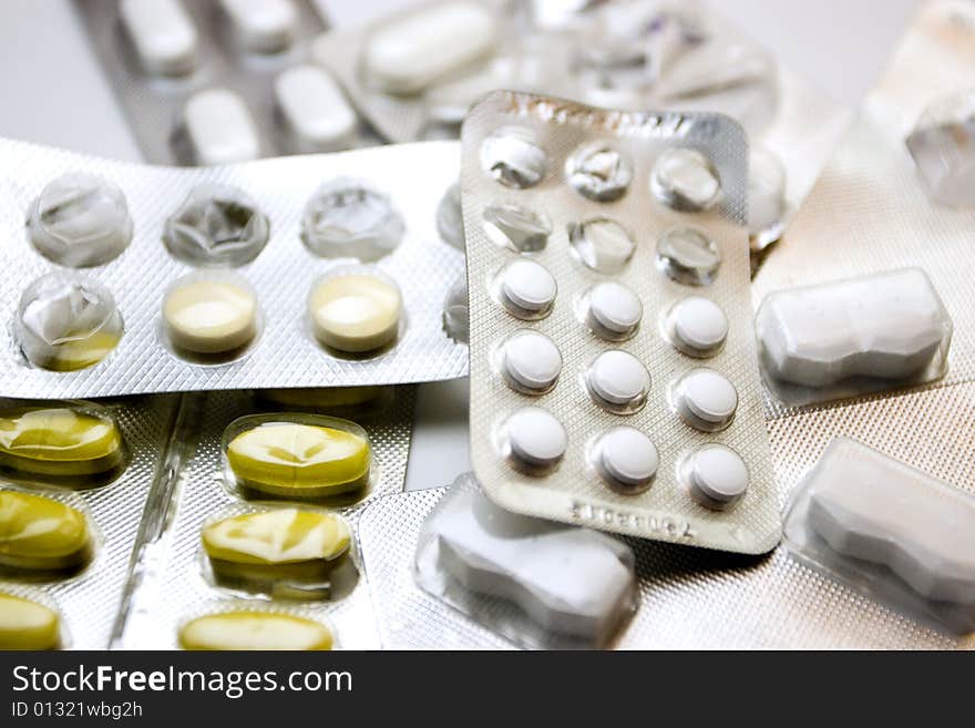 Lots of pills, isolated over white background